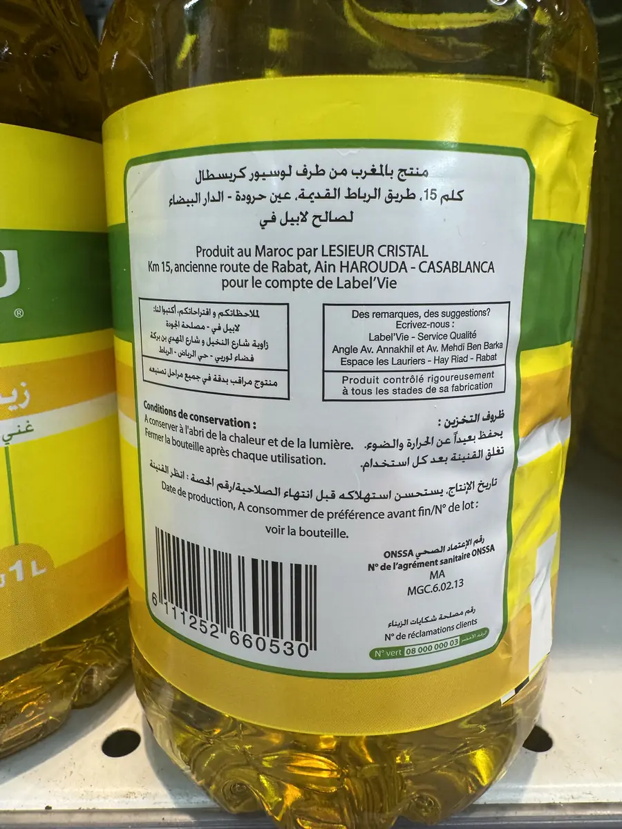 Надпись на бутылке Twimen: произведено в Марокко компанией Lesieur Cristal для сети Label Vie